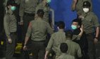 Pro-democracy activist Joshua Wong in custody in 2021.