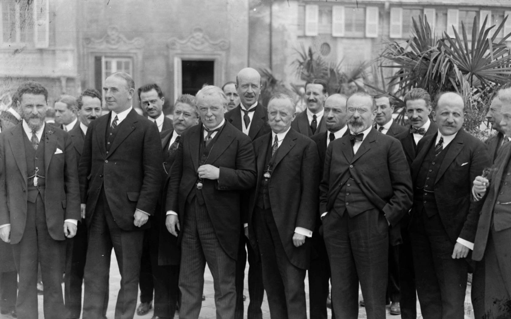 David Lloyd George and other members of the British delegation outside the Palazzo Reale at Genoa with other Allied leaders, 1922.