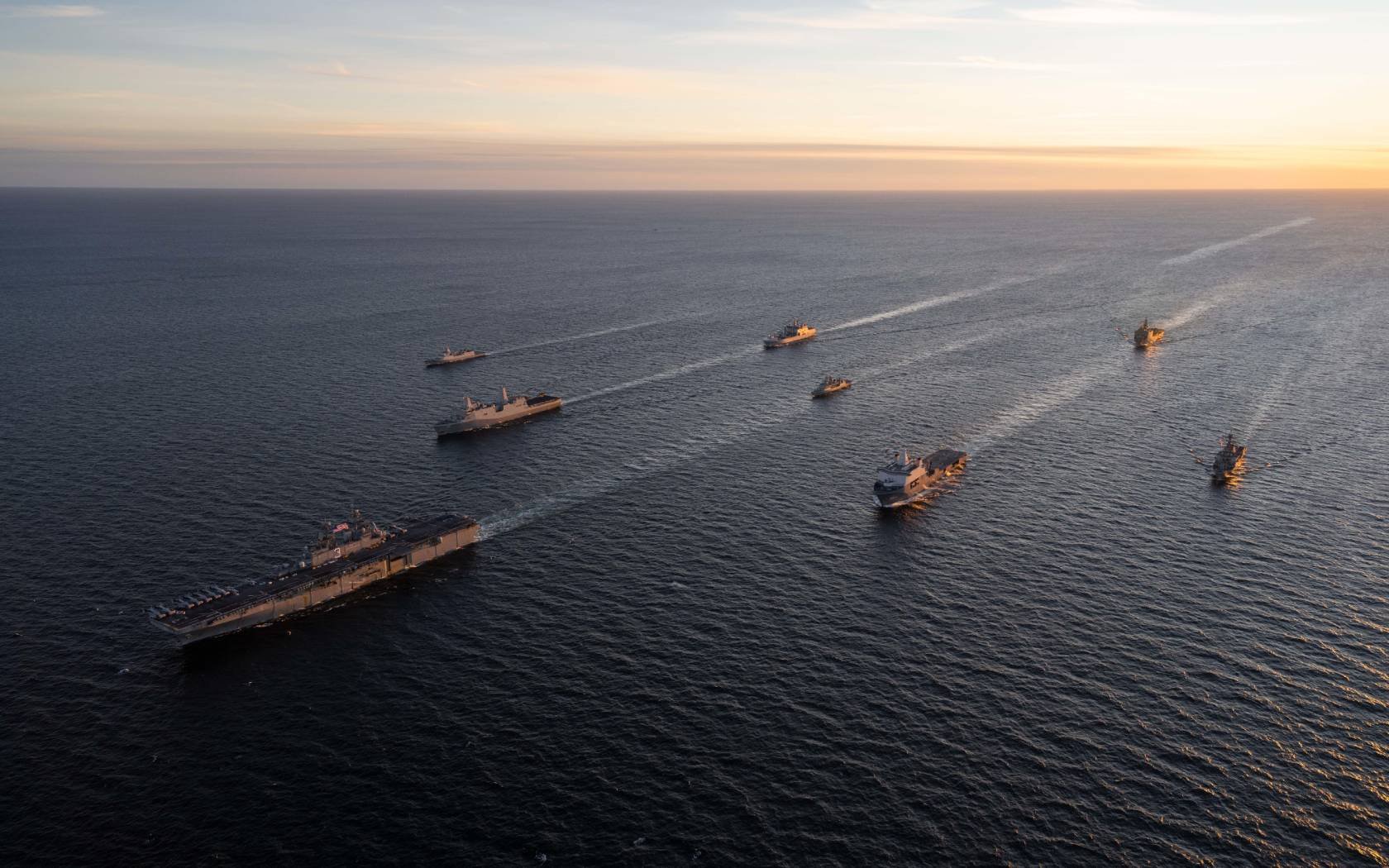 The U.S. Navy Wasp-class amphibious assault ship USS Kearsarge leads a formation with ships from the Netherlands, Portugal and Norway during a NATO exercise in the Baltic Sea.