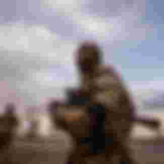 Russian troops on the Russian/Ukrainian border in 2015. Credit: Tommy E Trenchard / Alamy Stock Photo