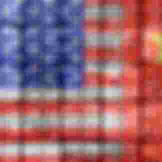 Flags of the USA and China on stacked containers. Credit: Christian Ohde / Alamy Stock Photo
