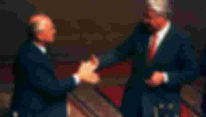 Soviet President Mikhail Gorbachev shakes hands with Russian President Boris Yeltsin in the Russian Parliament after failed coup attempt against Gorbachev in August, 1991. Credit: REUTERS / Alamy Stock Photo.