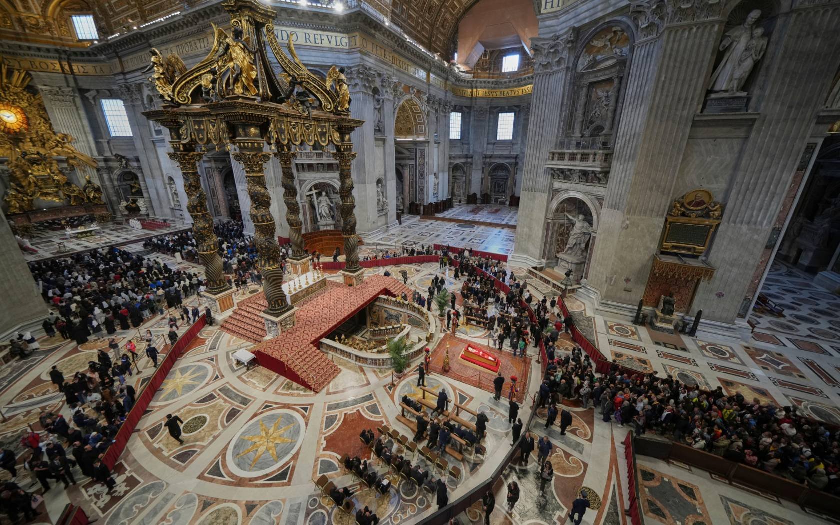 The Catholic faithful pay their respects to Pope Francis lying-in-state inside St. Peter's Basilica at the Vatican.