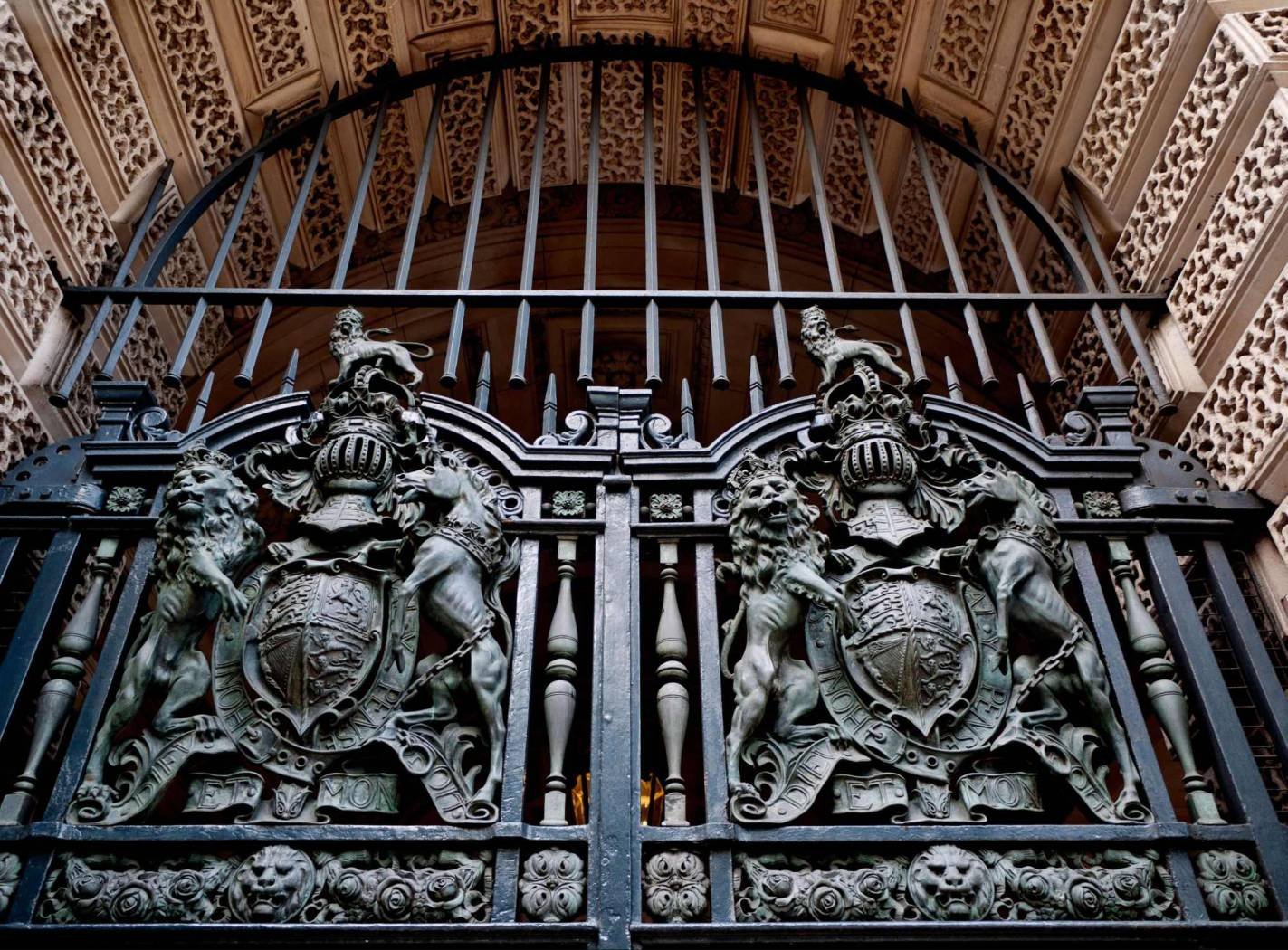 Heraldic gates at an entrance to the Foreign, Commonwealth and Development Office in Whitehall. London, United Kingdom.