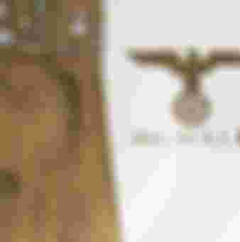 A large Sèvres presentation plate celebrating Nazism's alleged debt to Charlemagne.