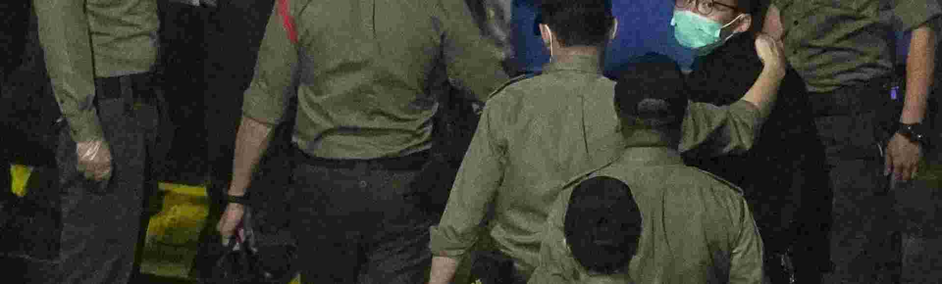 Pro-democracy activist Joshua Wong in custody in 2021.