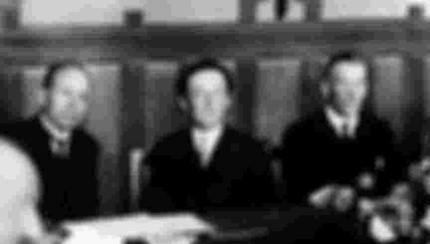 British Foreign Secretary Austen Chamberlain, right, was a key player at the Locarno Conference. Benito Mussolini, Prime Minister of Italy, sits far left.