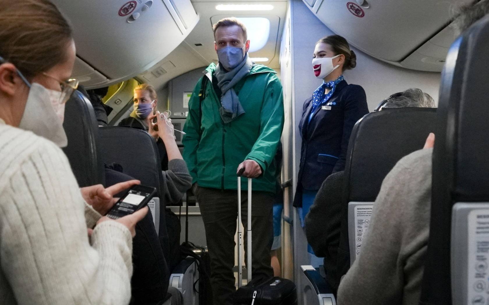 Alexei Navalny and his wife Yulia board the plane prior to flight to Moscow, 17 January 2021.