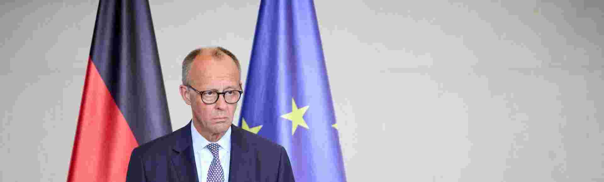German Chancellor Friedrich Merz, listens to a question during a joint press conference with Ukrainian President Volodymyr Zelenskyy, in Berlin, Germany, 13 August 2025.
