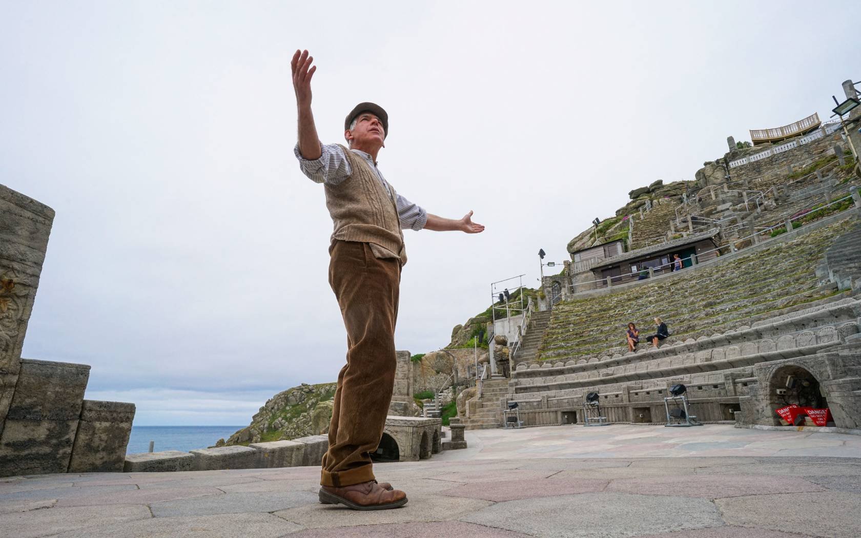 Actor Mark Harandon beckons to a lonely stage at the Minack Theatre, Cornwall, England, this summer.