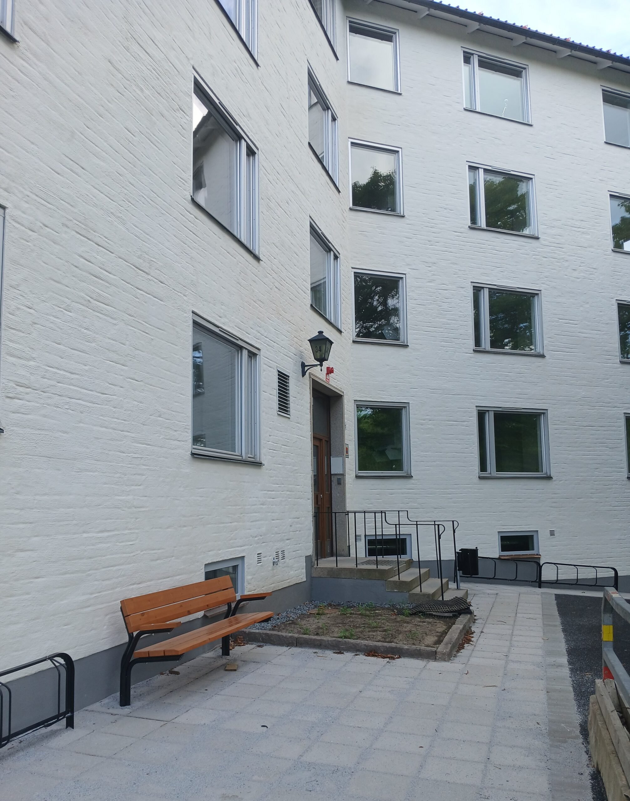 Exterior of white building.