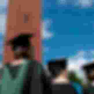 Students graduating from Birmingham University, England. Credit: Malcolm McDougall Photography / Alamy Stock Photo.