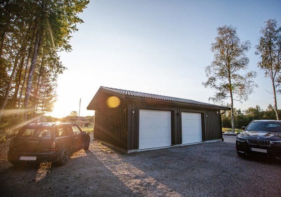 Garage with Mini Cooper beside