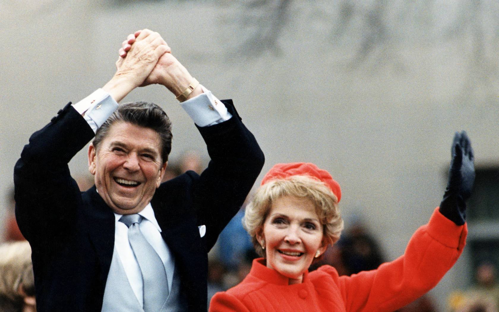 The Reagans waving to the crowd during the Inaugural Parade on January 20, 1981.