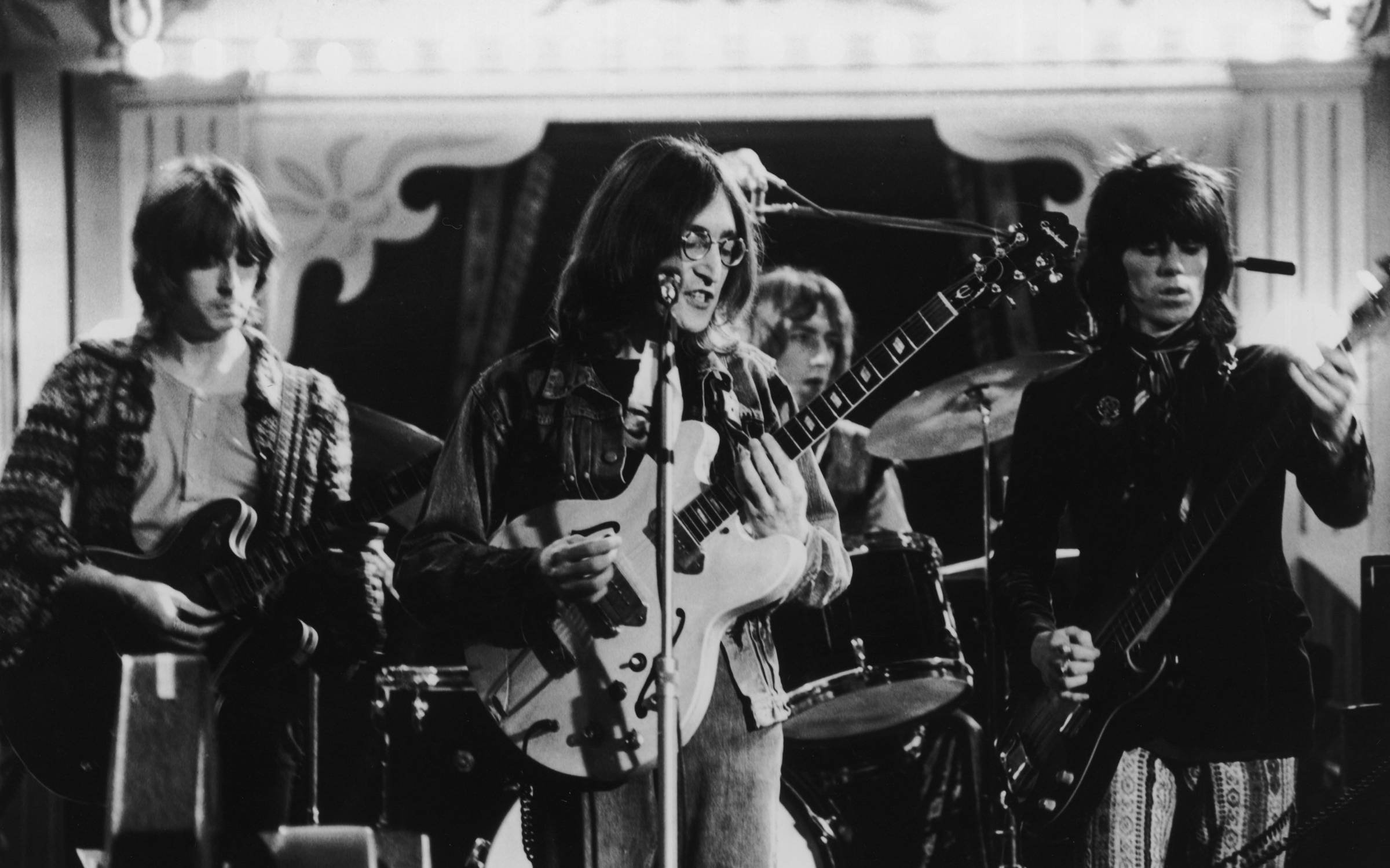 Eric Clapton, John Lennon (1940 - 1980) and Keith Richards performing together at the Rolling Stones Rock And Roll Circus, Internel Studios in Stonebridge Park, Wembley, December 1968.