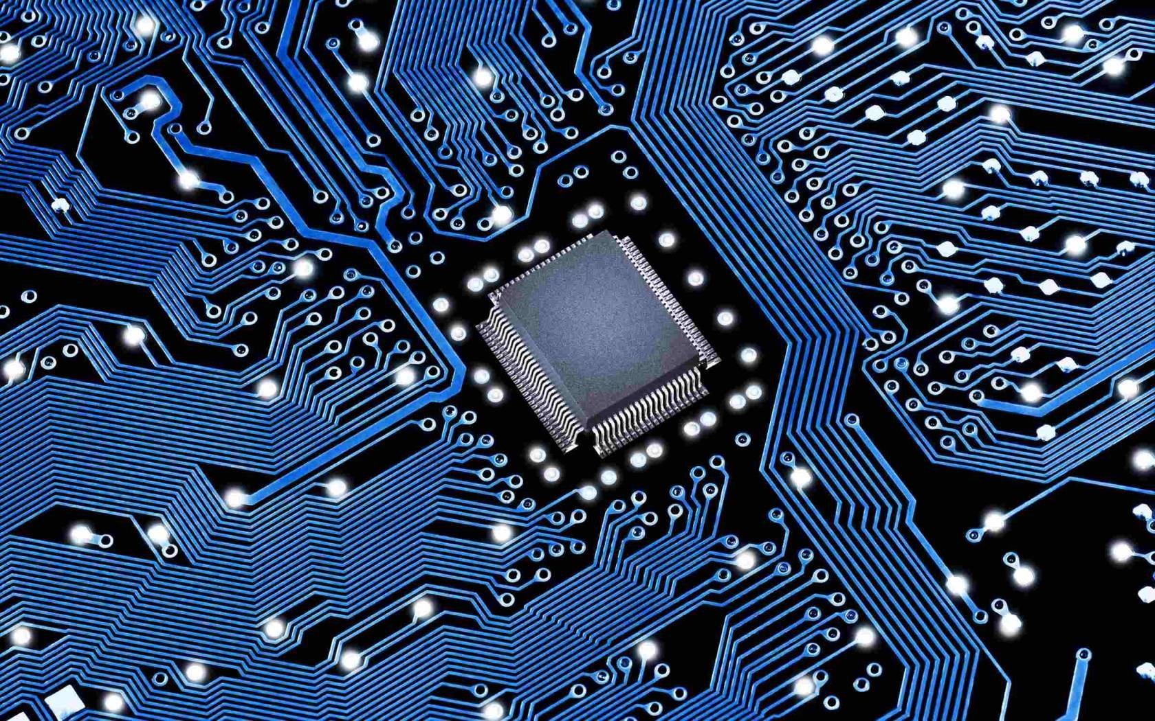 Black-blue PCB with a microchip.