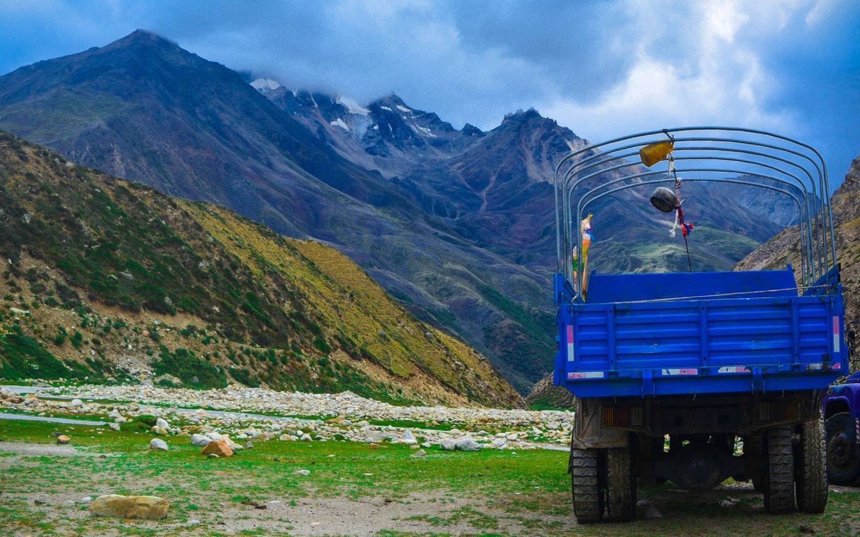 A truck owned by a Nepali man Kul Chering. He is reported to be the first person to buy a vehicle from China and use it for the transportation of goods from China to Nepal in the Limi valley.