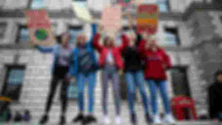 School children protest at a climate rally. Credit: Getty Images.