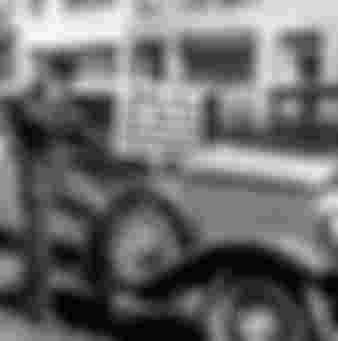 A city speculator trying to sell his car for $100 cash after having lost everything on the stock market (1929).