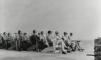 People in goggles watching the first test in a series, Operation Greenhouse, that tested principles leading to developing thermonuclear weapons (hydrogen bombs)