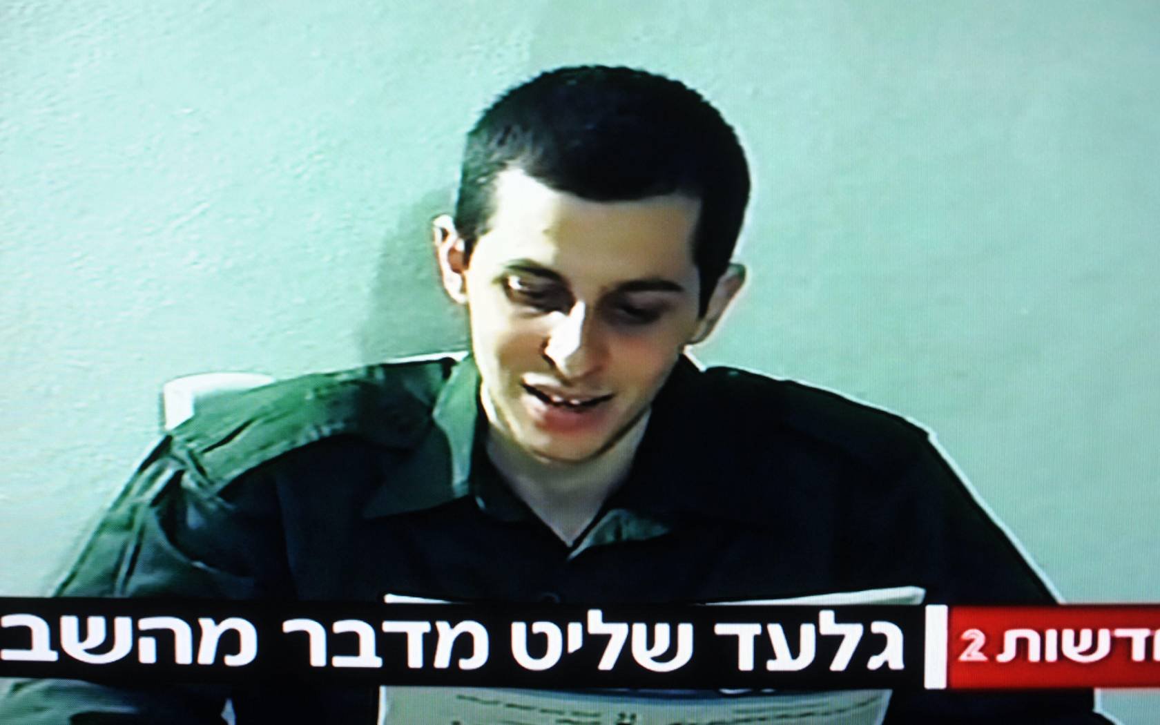 Taken from a video released by Hamas of the kidnapped Israeli soldier Gilad Shalit reading a letter to his family on September 14, 2009.