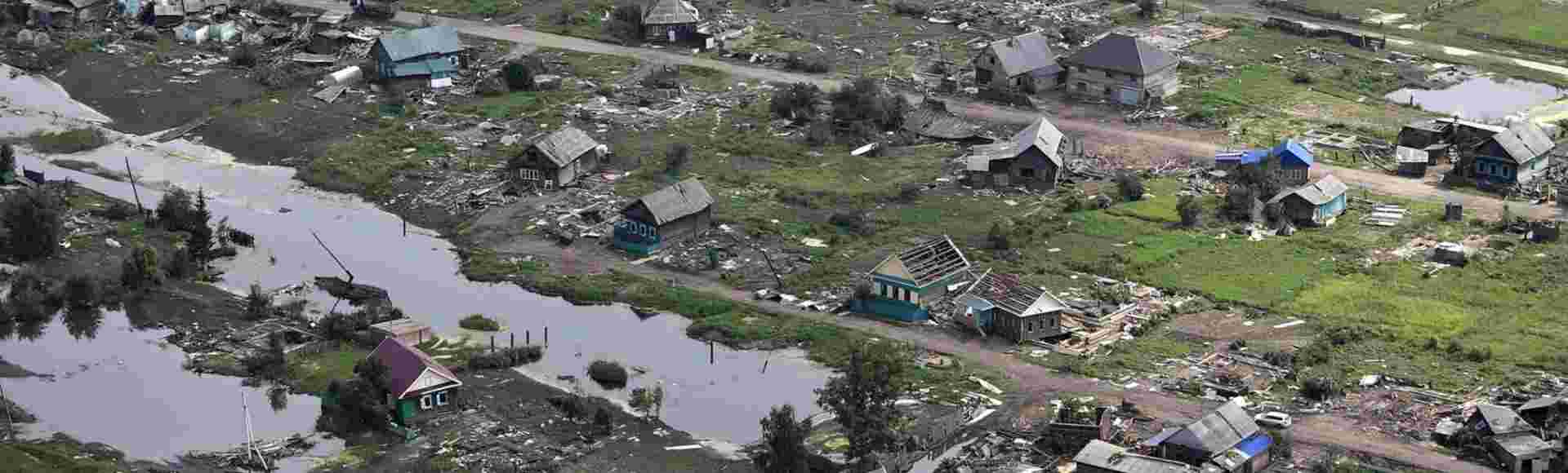 Aerial view of severe damage to homes caused by massive floods in the Irkutsk region of Russia, 2019.