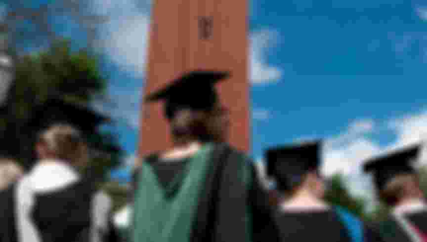 Students graduating from Birmingham University, England. Credit: Malcolm McDougall Photography / Alamy Stock Photo.