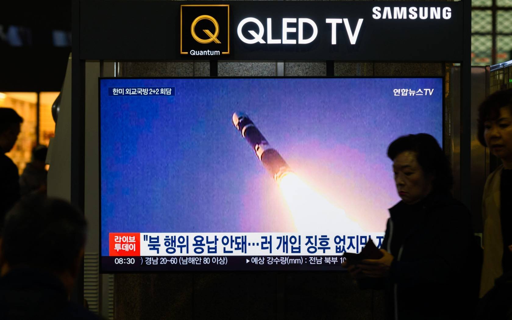 Yongsan Railway Station in Seoul showing a news broadcast of a test launch of new intercontinental ballistic missile (ICBM) 'Hwasong-19' at an undisclosed place in North Korea.