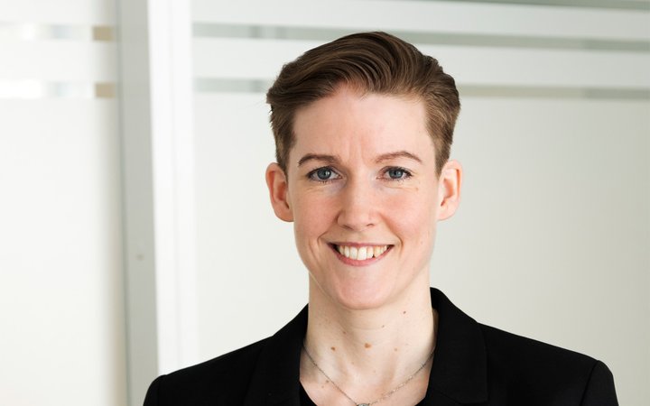 Porättbild av Lisa i kontorsmiljö.