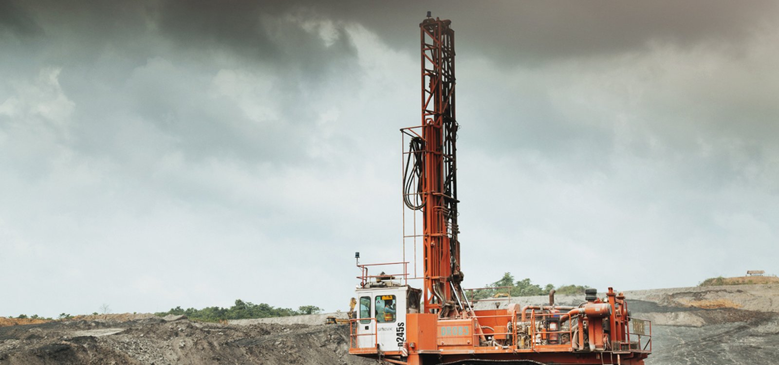 Two Sandvik D245S blasthole drill rigs at Jembayan are always on the move, drilling the 8.5-metre-deep holes that the blasting team fills with explosives several times a day.