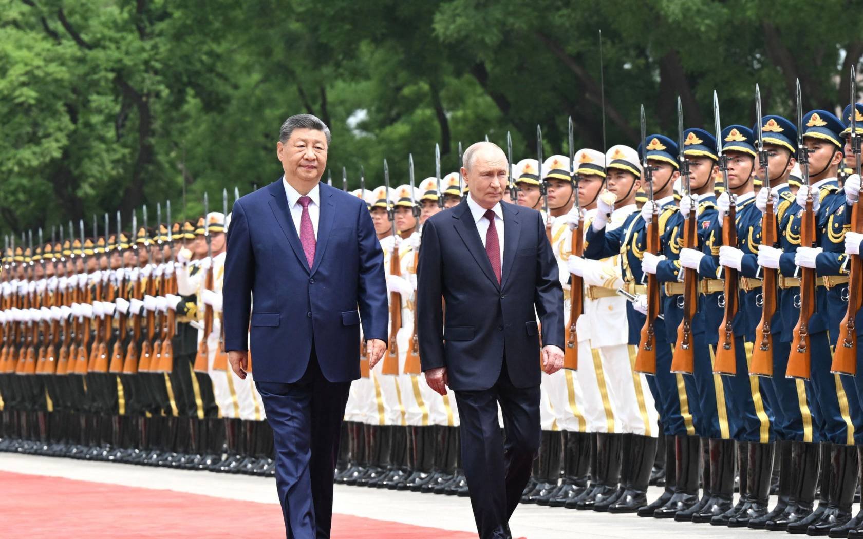 Chinese President Xi Jinping holds a welcome ceremony for Russian President Vladimir Putin.