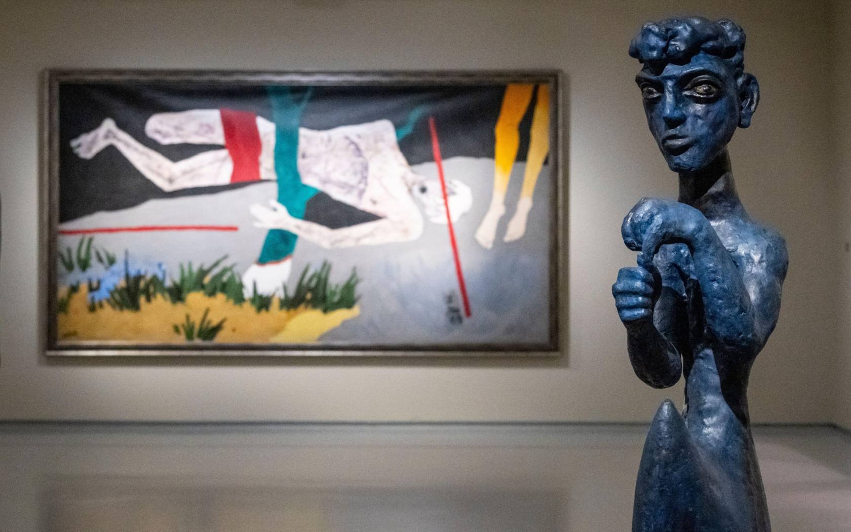 'Safdar Hashmi', 1989, by M. F. Husain and 'Boatman-2', 1988, by K. P. Krishnakumar at a preview of ‘The Imaginary Institution of India: Art 1975-1998’.