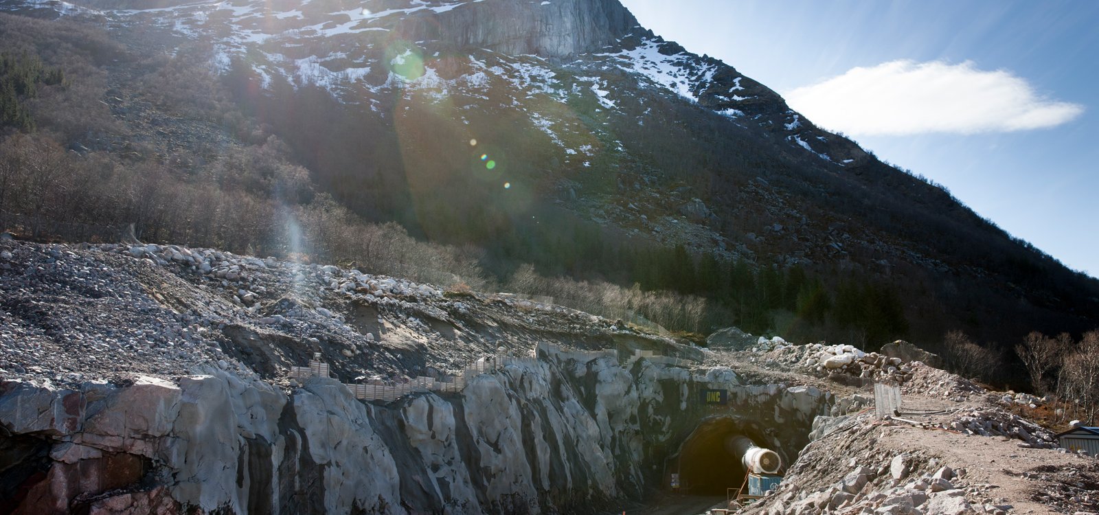 The tunnelling site near the Bratland community is tightly flanked by towering mountains and clear blue fjords.