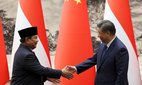 Chinese President Xi Jinping, right, and Indonesian President Prabowo Subianto shake hands during their meeting at the Great Hall of the People, in Beijing, Saturday, Nov. 9, 2024. Associated Press / Alamy Stock Photo
