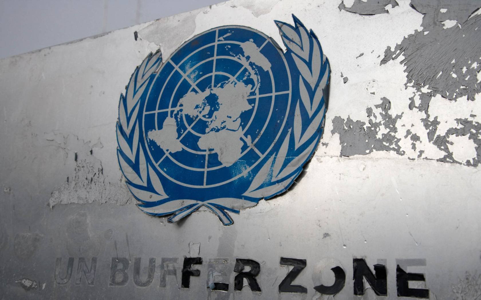 A weathered UN buffer zone sign in the 'green line' dividing North and South Cyprus in Nicosia.