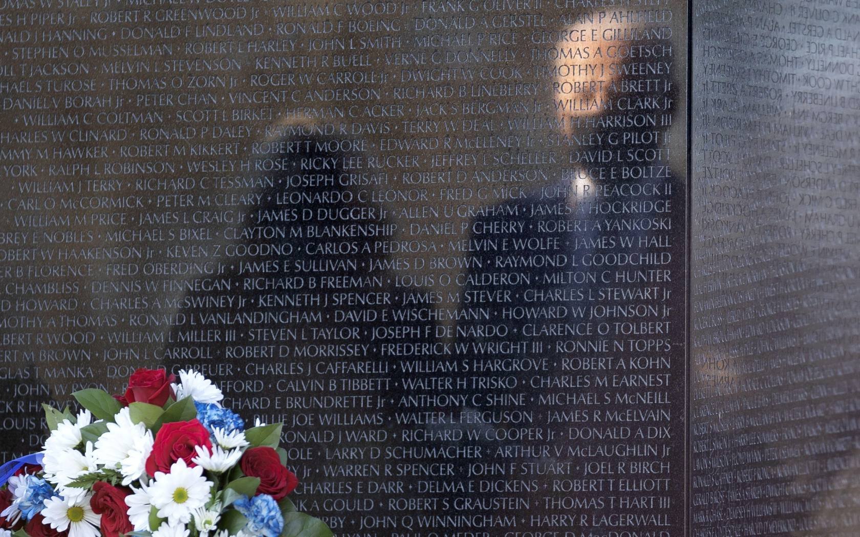Joe Biden and Jill Biden at the Vietnam War Memorial in Washington DC, March 2021. Credit: UPI / Alamy Stock Photo