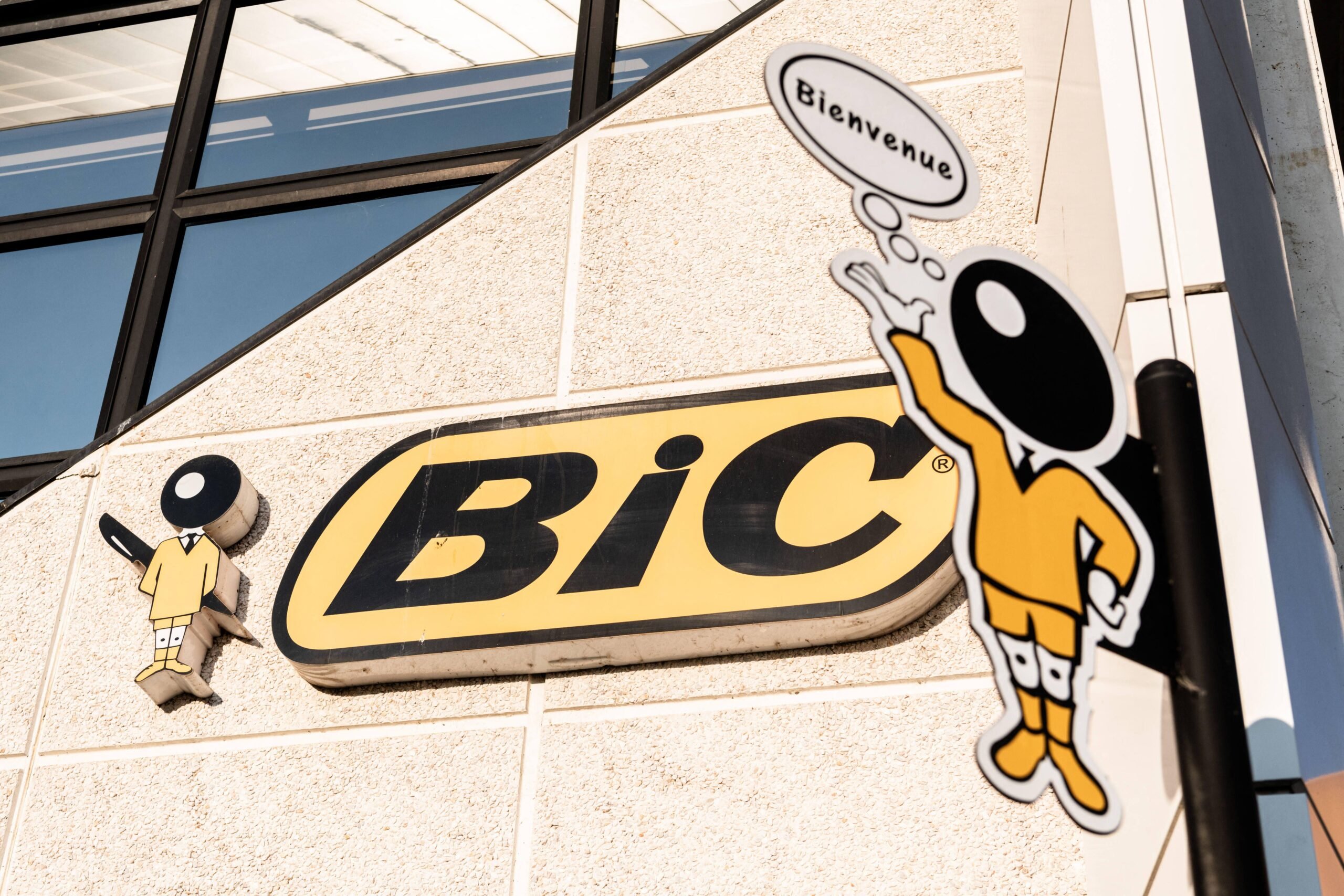 A sign welcomes visitors outside the Bic Factory in Montsévrain, France