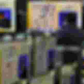 TV screens showing the live broadcast of the Google DeepMind Challenge Match at Yongsan Electronic Technology Land in Seoul, South Korea.