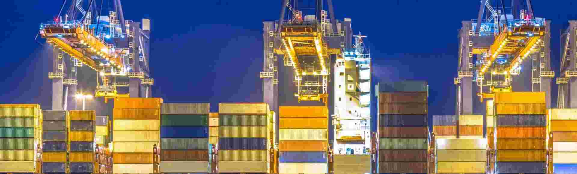 Container ship from China unloaded at automated harbor terminal in Maasvlakte Europoort port of Rotterdam, Netherlands.