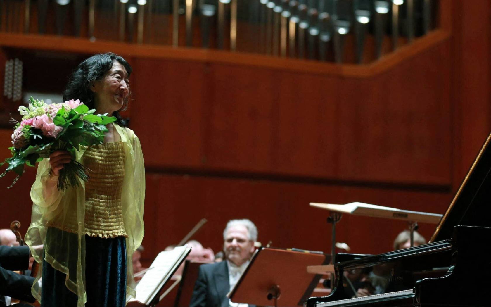 Mitsuko Uchida acknowledges the applause.