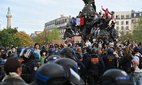 High school pupils occupy the statue in Place de la Nation in Paris.