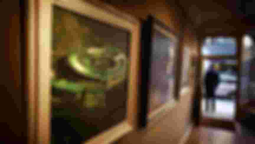 A painting of the government listening station GCHQ displayed at the 'A Year with MI6' exhibition at the Mount Street Gallery, London. Credit: Macdiarmid/Getty Images