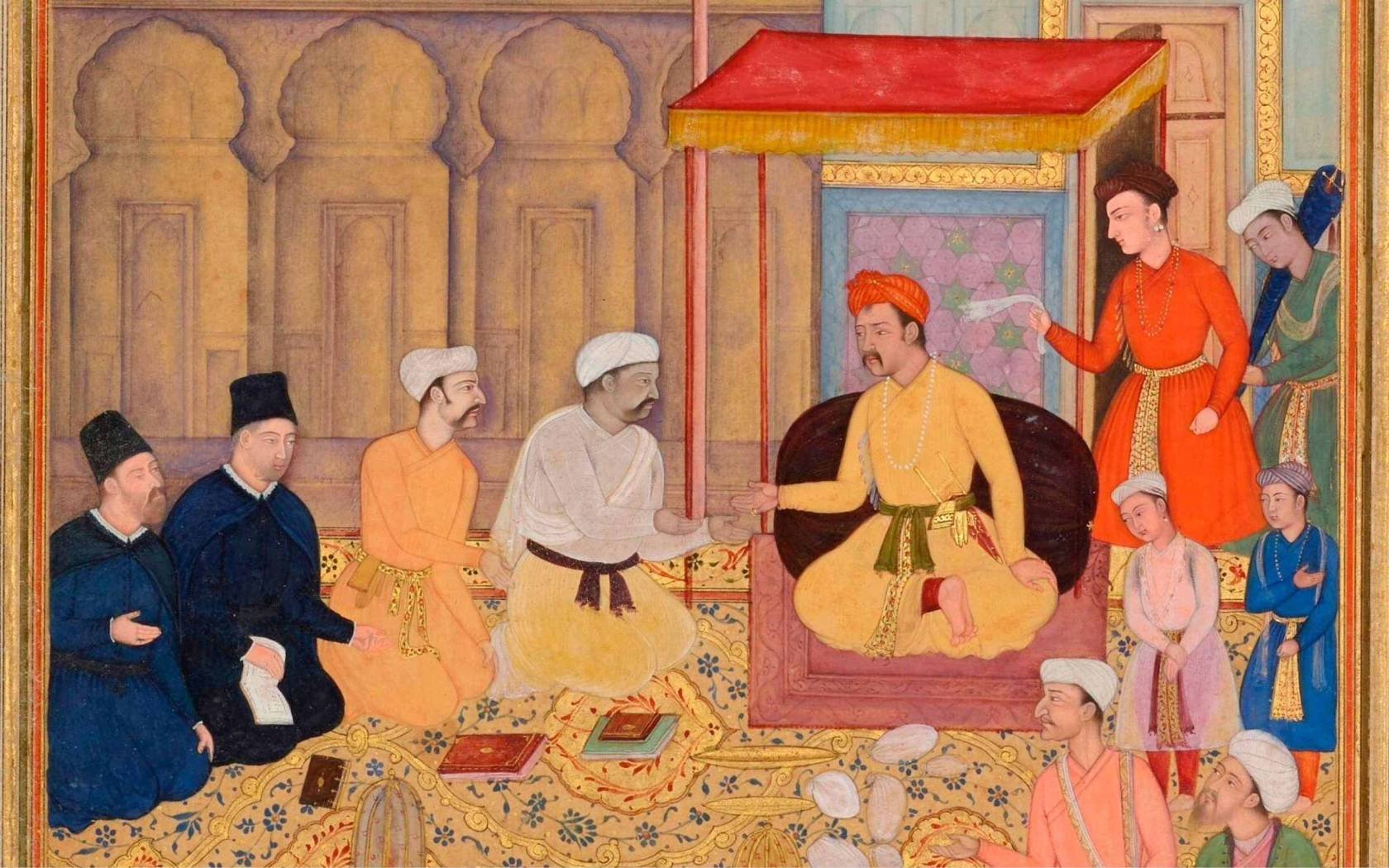 Mughal Emperor Akbar (r. 1556-1605) holds a religious assembly in the Ibadat Khana (House of Worship) in Fatehpur Sikri, attended by Muslim scholars and Jesuit missionaries.