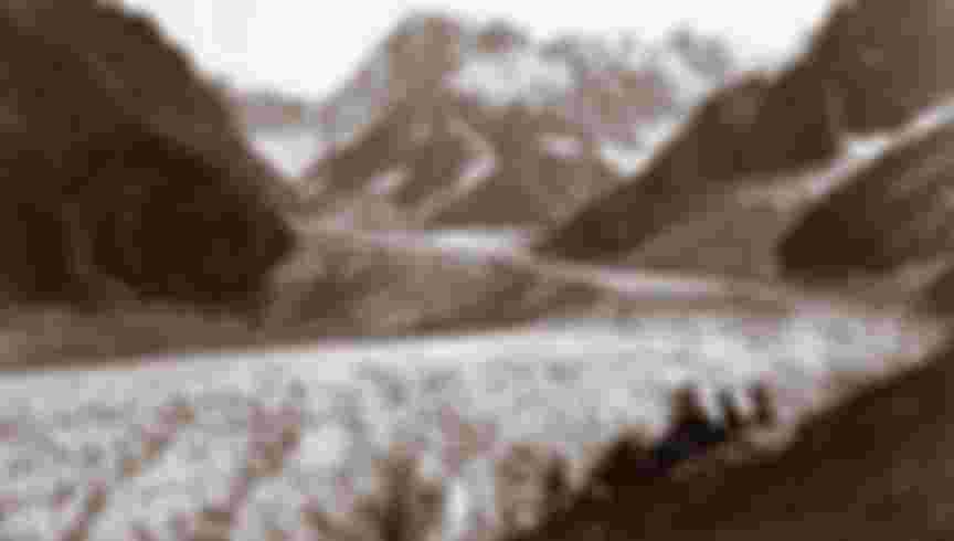 Couple resting by the sea of ice near Chamonix in the Alps