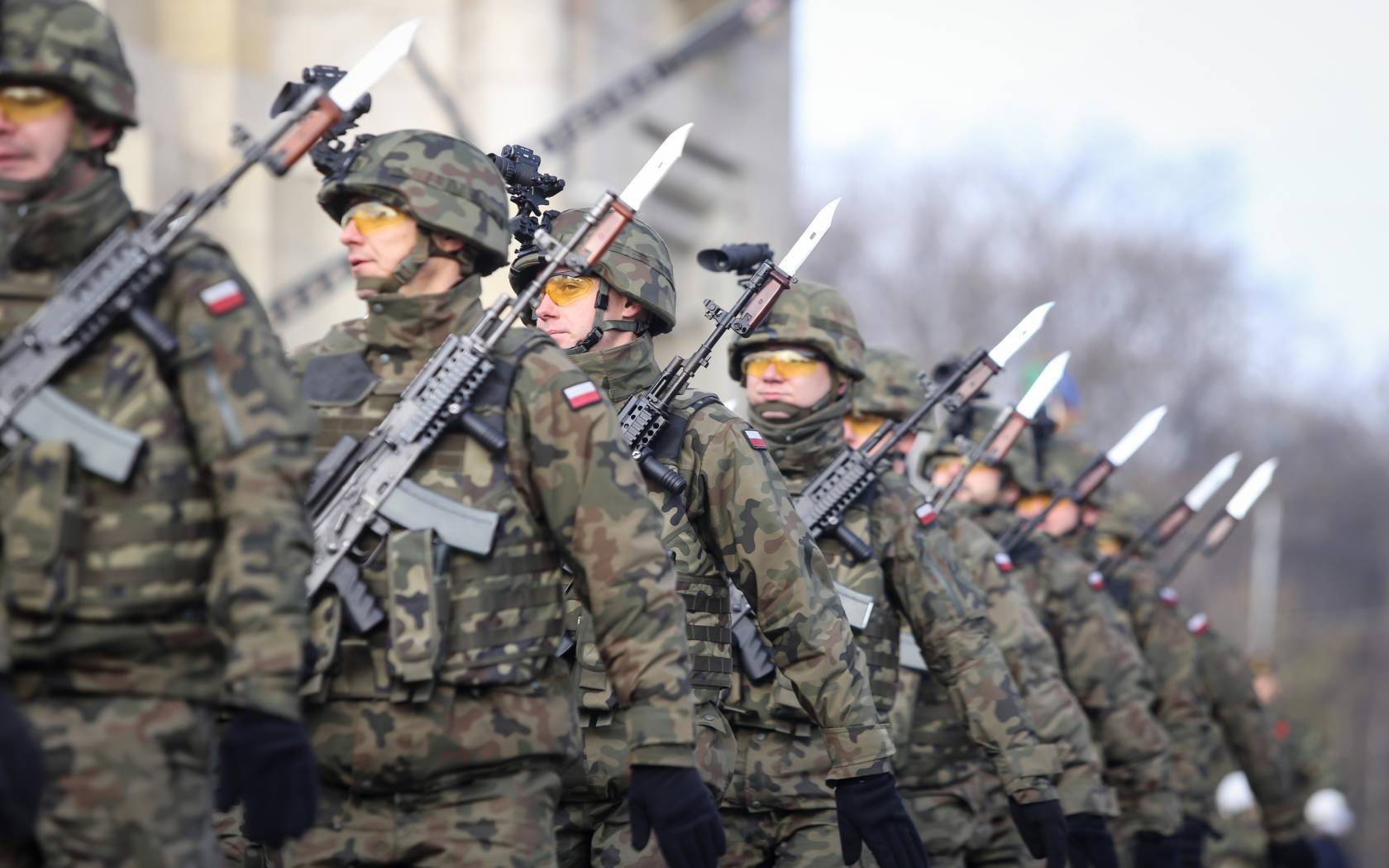Polish soldiers armed with Beryl assault rifles.