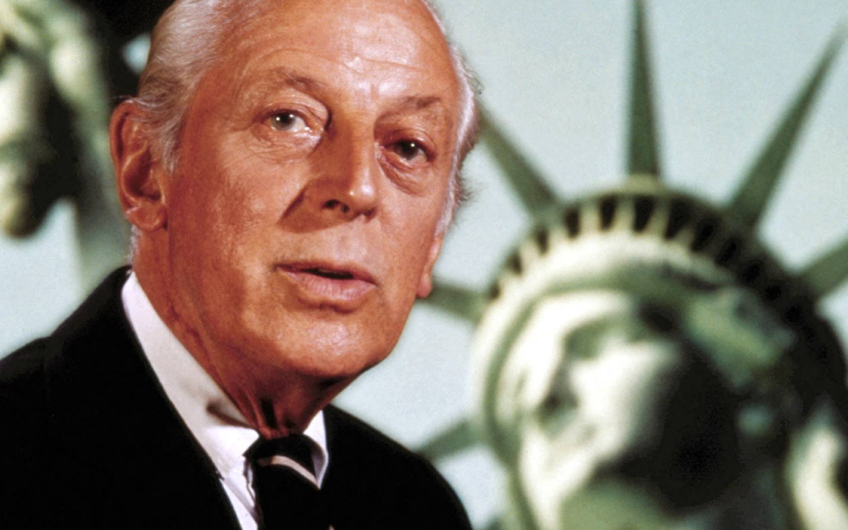 Alistair Cooke.