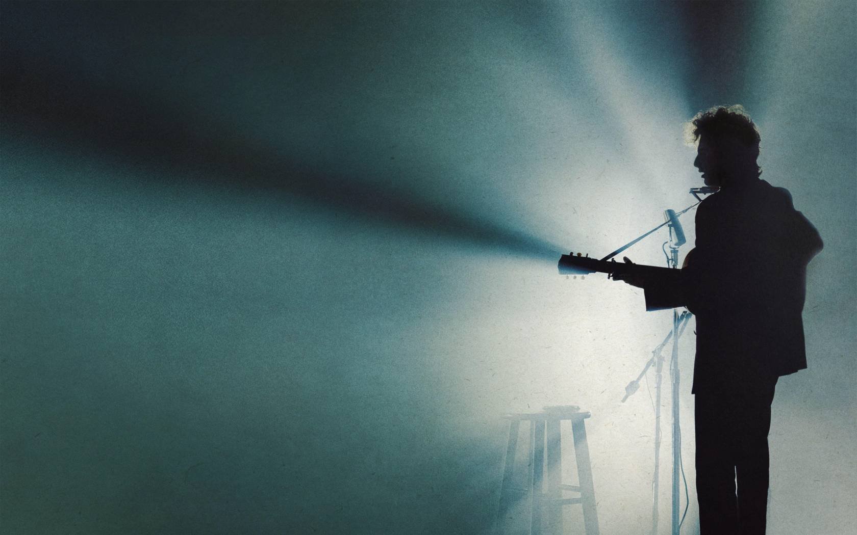 Still from A Complete Unknown featuring Timothée Chalamet as Bob Dylan.