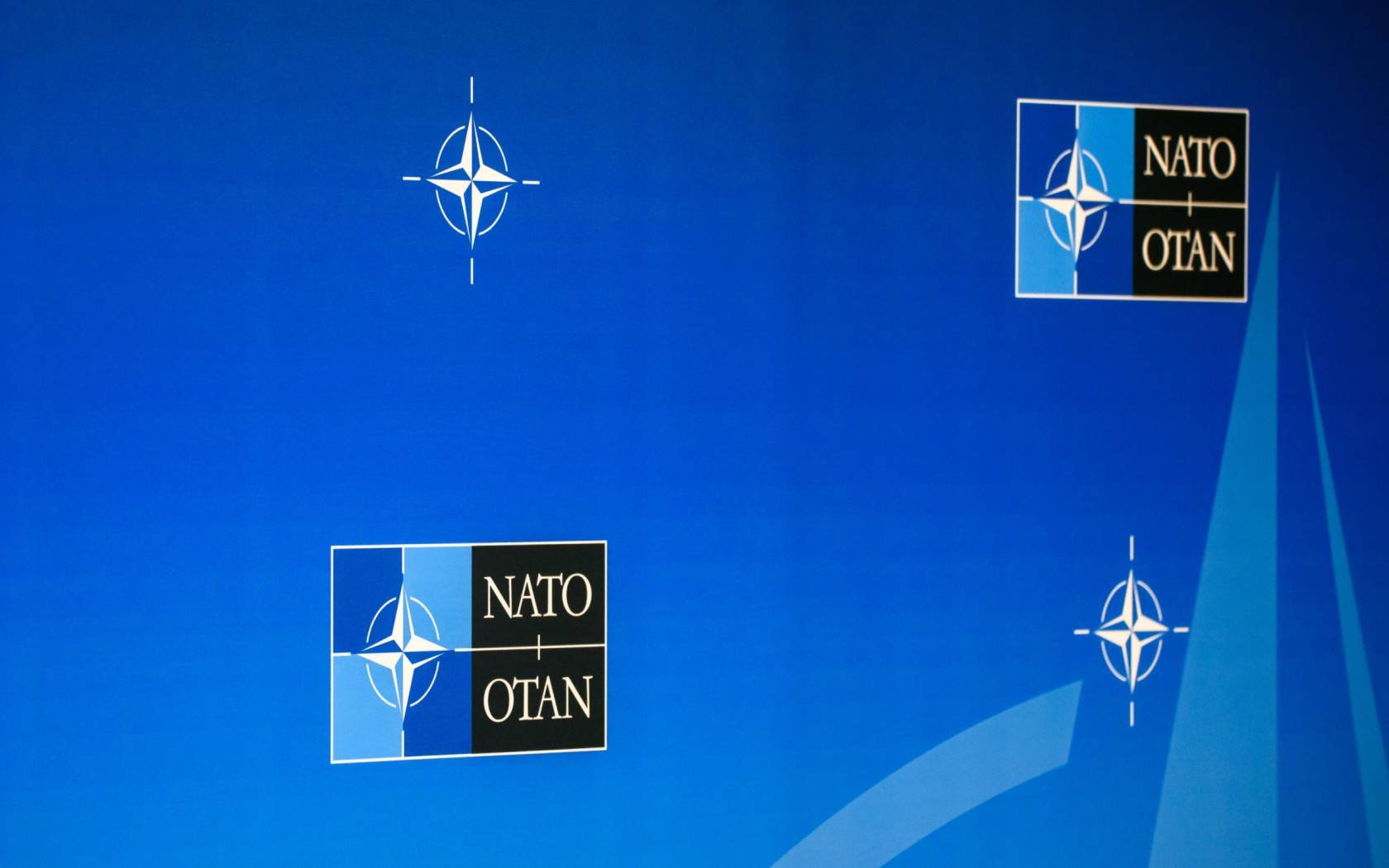 The NATO logo.