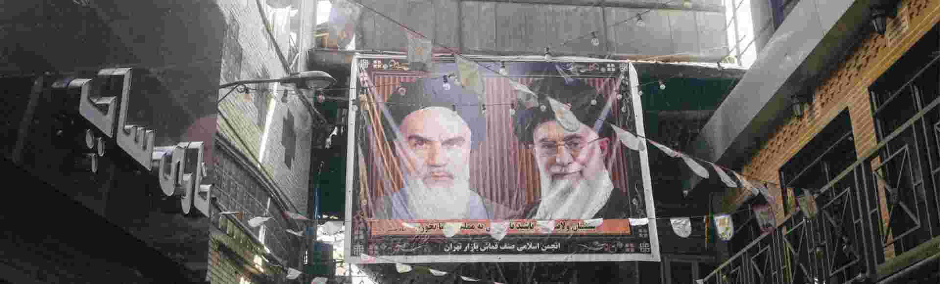 A poster of Ali Khamenei and Ruhollah Khomeini in the Grand Bazaar in Tehran.
