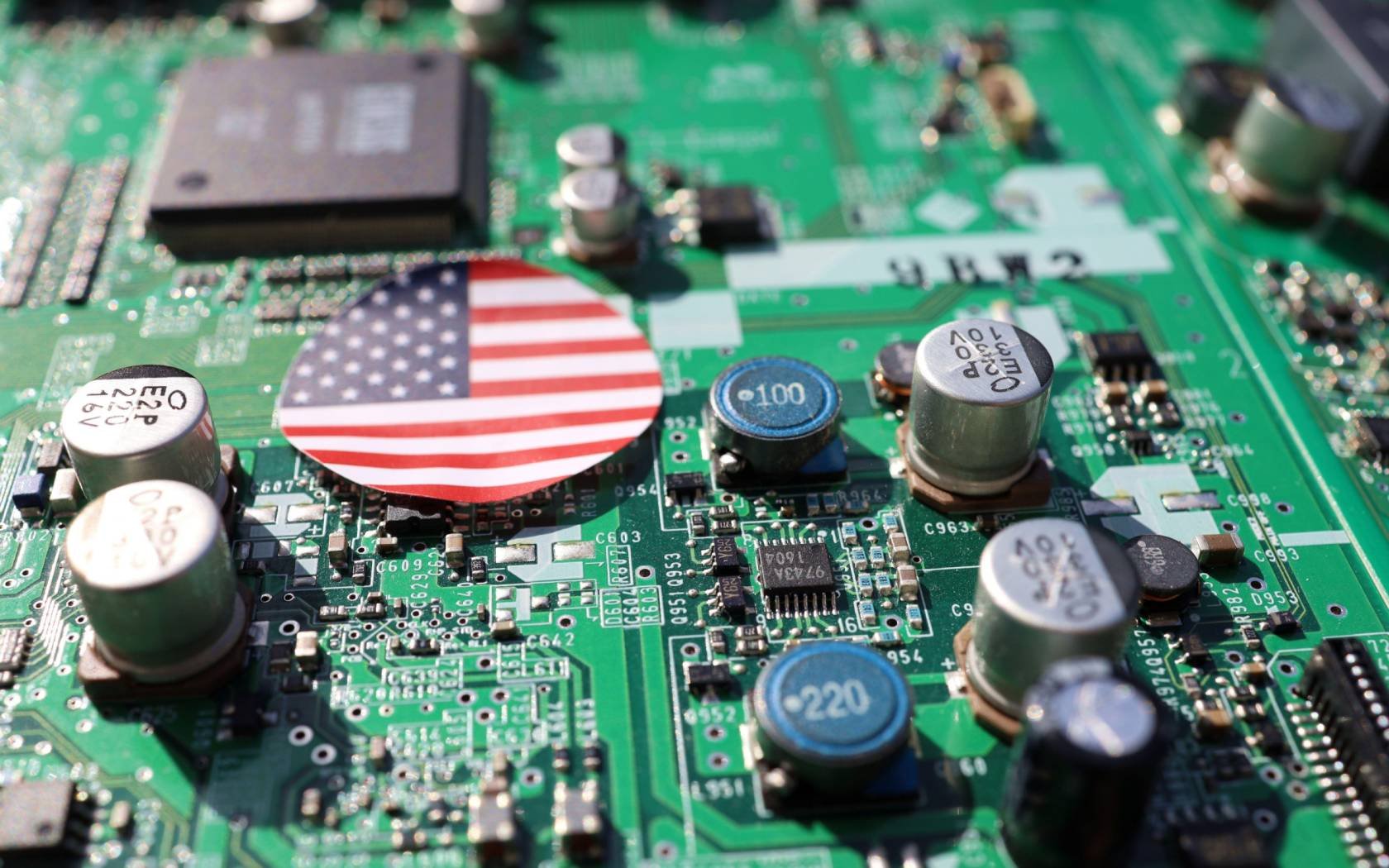 A semiconductor circuit board with an American flag.